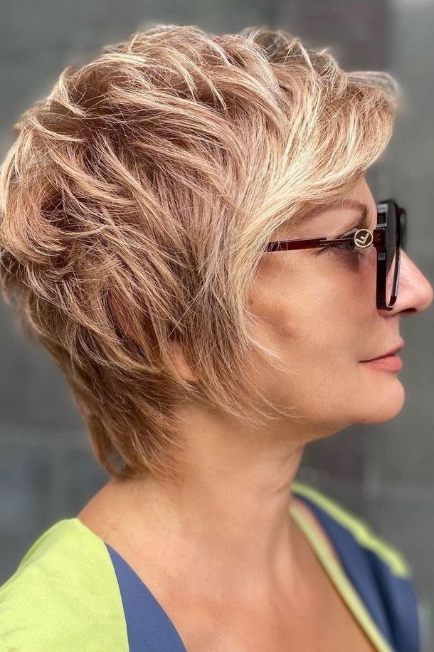 Rose blonde feathered pixie, side view with sunglasses for women over 60