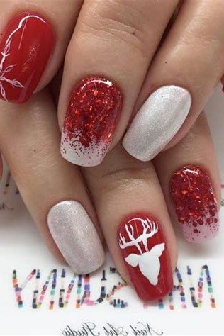 Red glitter and white with reindeer art - Christmas nail design for older women