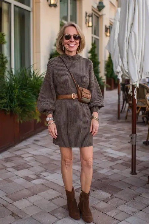 Brown ribbed sweater dress with tan belt and brown ankle boots