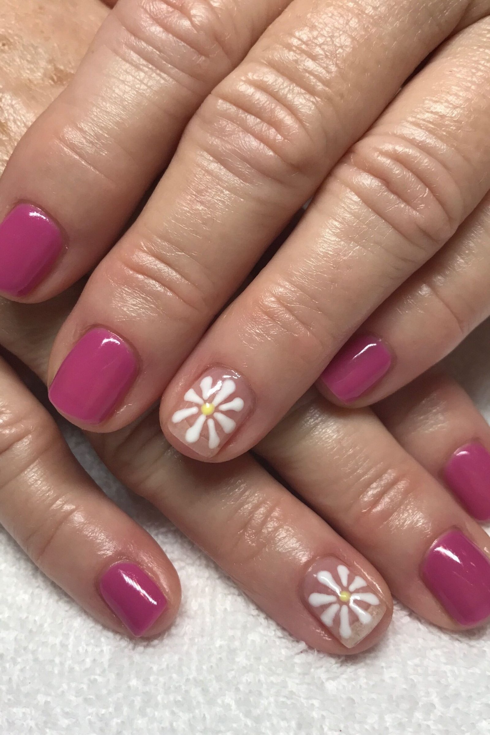 Magenta with White Daisy Accent - short nail design for women over 40