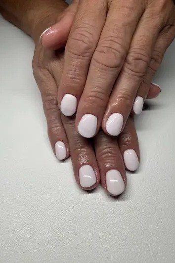 Milky white mature hands nails for women over 50