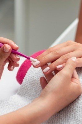 Salon Nail Painting Session - elegant nail art idea for mature hands, women over 50
