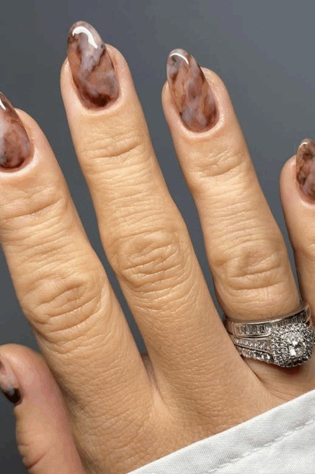 Marble Almond Nails with Rings, chocolate brown fall nail design for women over 60