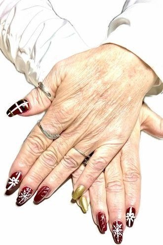 Red Snowflake Nail Art - winter nail trend for older women over 70