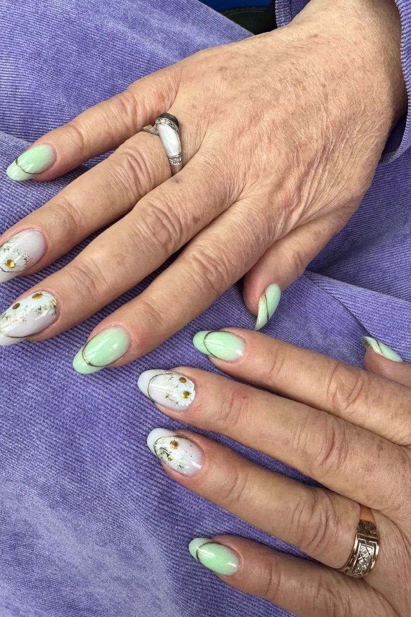 Mint green nails with art for older women