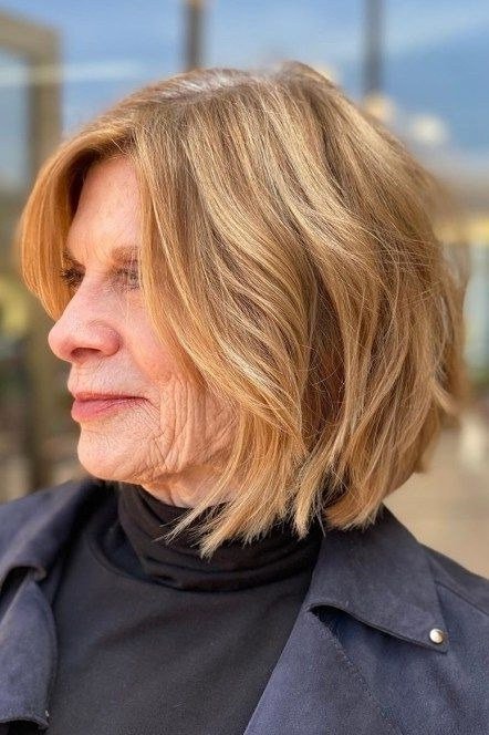 Copper Wavy Bob - trendy layered bob hairstyle for women over 50