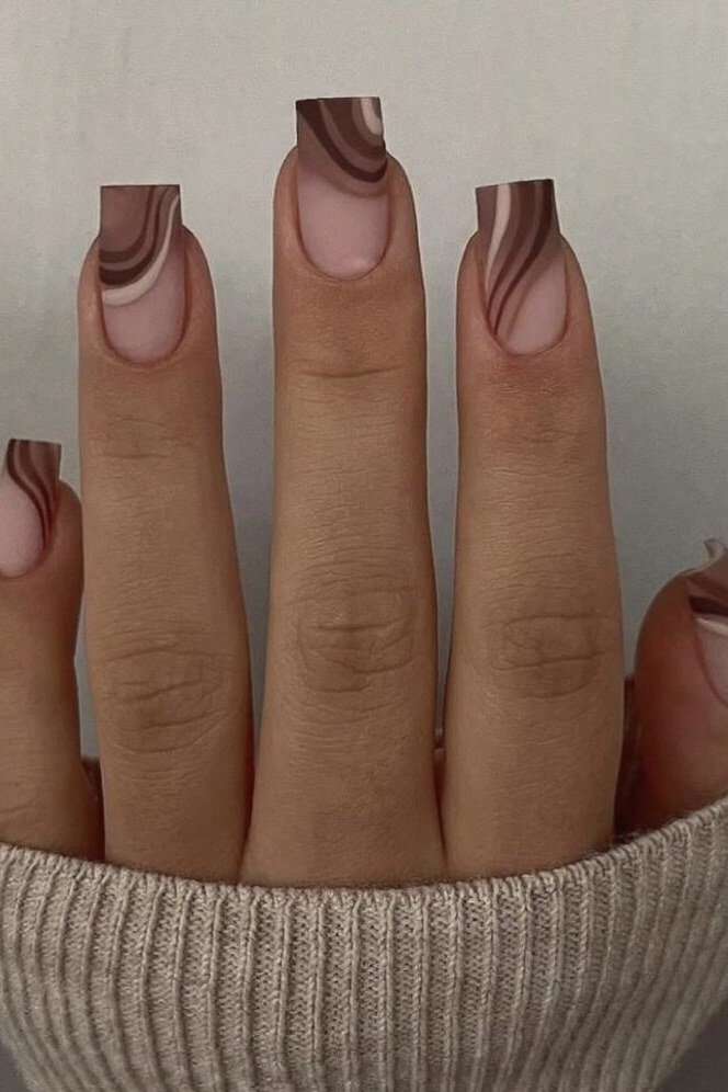 Nude almond nails with chocolate brown french tips, glossy autumn french variation.