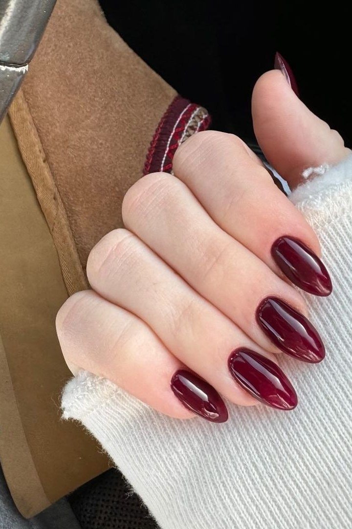 Deep Burgundy Short Almond Nails with Boots, fall nail color idea for women over 50