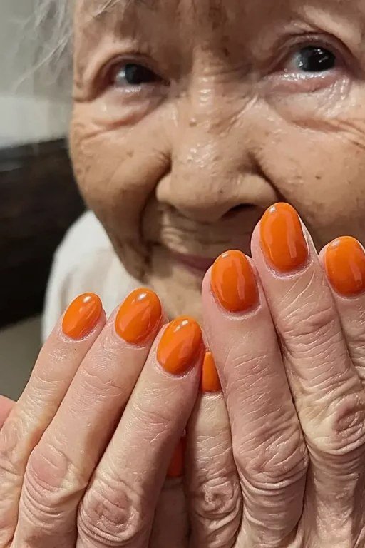 Bright Orange Short Nails for women over 70