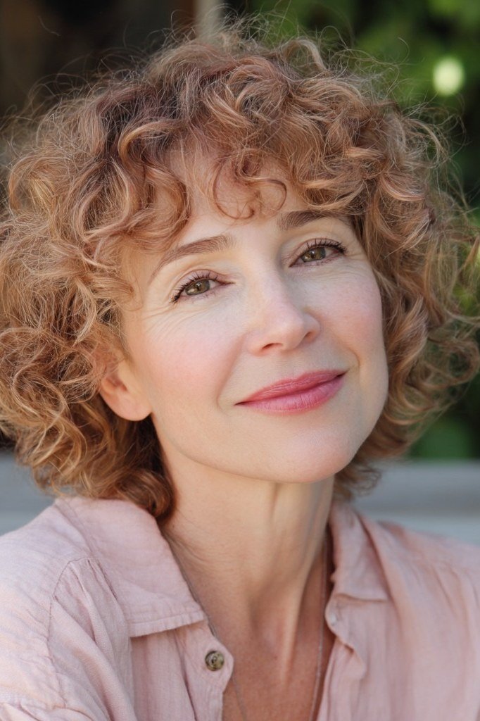 Copper Curly Bob - short curly hairstyle for women over 60