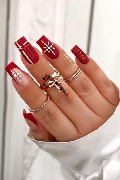 Red french tips with snowflake accent - Christmas nail design for older women