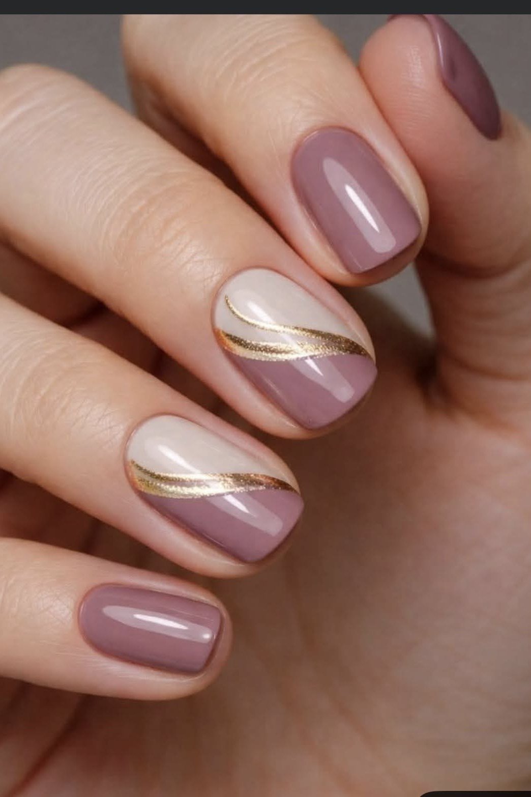 Mauve Nails with Cream and Gold Curved Lines, elegant mauve nail idea for women over 60