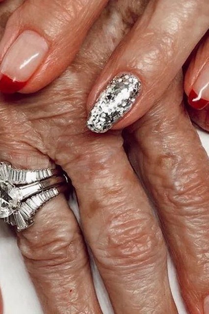 Red with Silver Glitter Accent and Bold Rings gel nails for women over 60