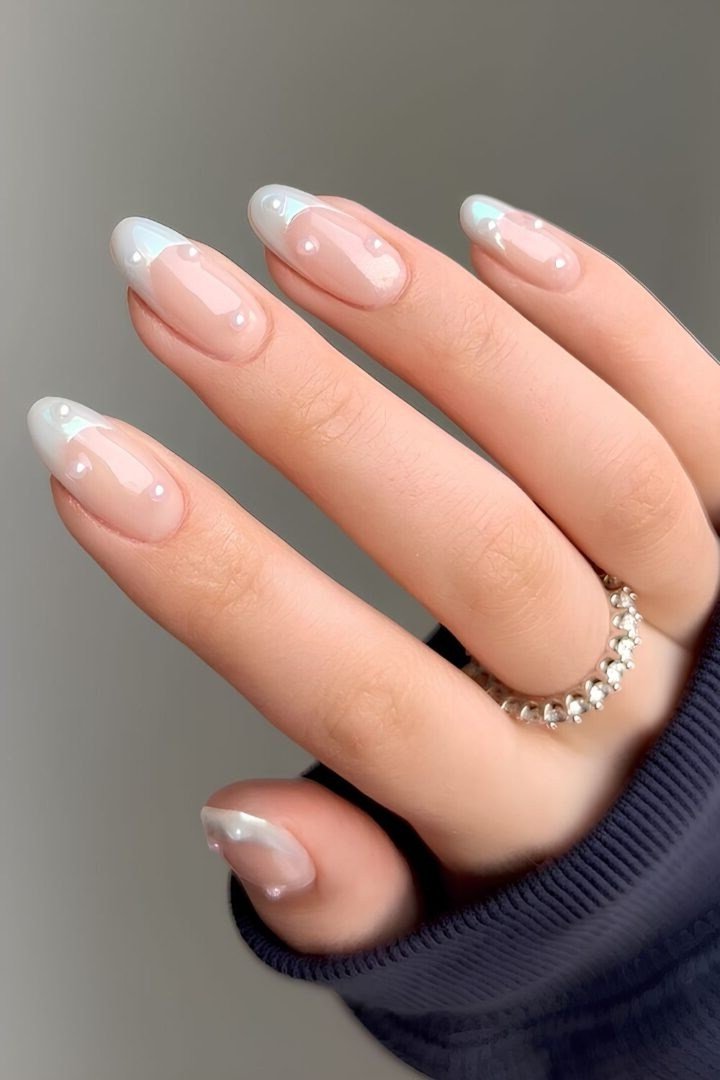 Minimal White French Almond Nails - pearl finish nail idea for women over 60