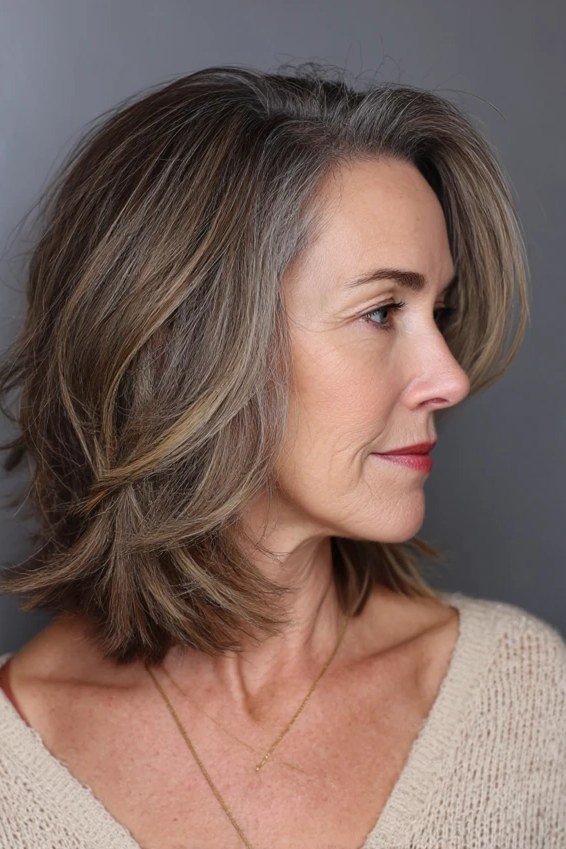 Brunette rounded bob with a smooth curved silhouette for women over 60