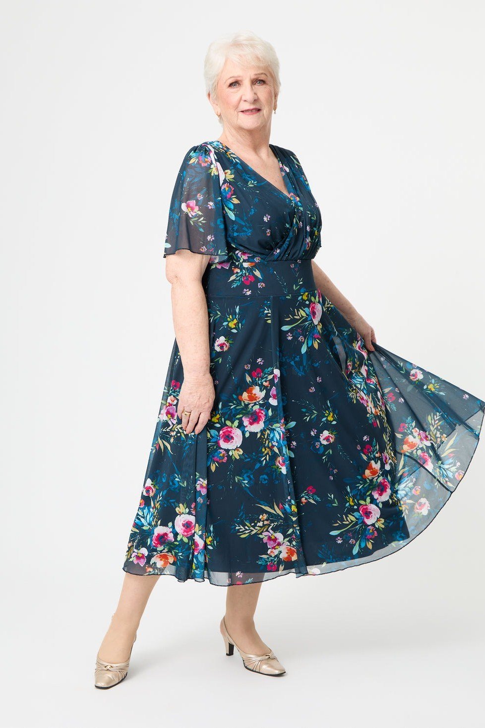 Navy floral wrap midi dress, white background - wedding guest outfit for women over 50