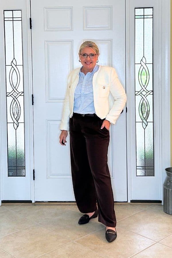 Camel Coat with a Red Scarf and Jeans on a woman over 50, fall outfit idea