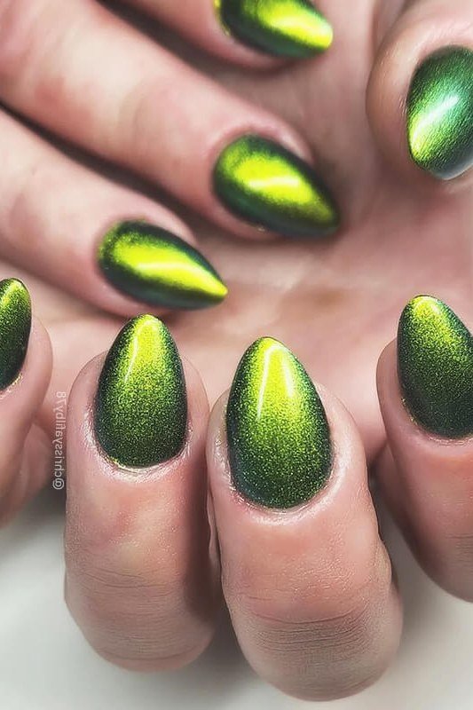 Lime Green Cat Eye Nails - Bright lime green with glowing magnetic shimmer covers these short to medium almond nails.