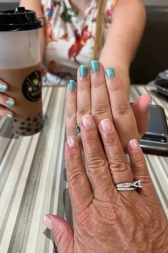 Bright turquoise nail polish for women over 60