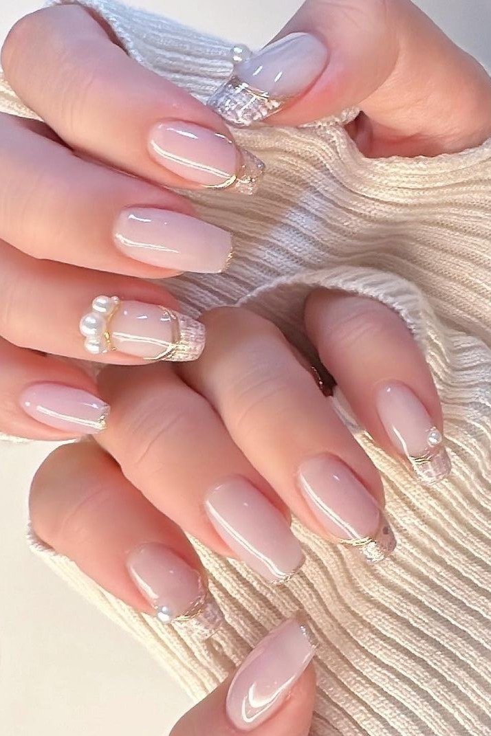 Pink french with rhinestone tip art