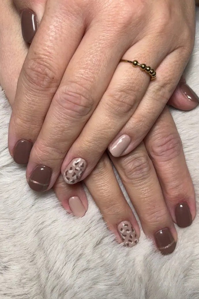 dark taupe nails with leopard print accent nails