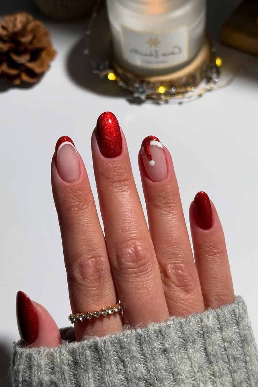 Deep red with nude accent nail, grey sweater - Christmas nail design for older women
