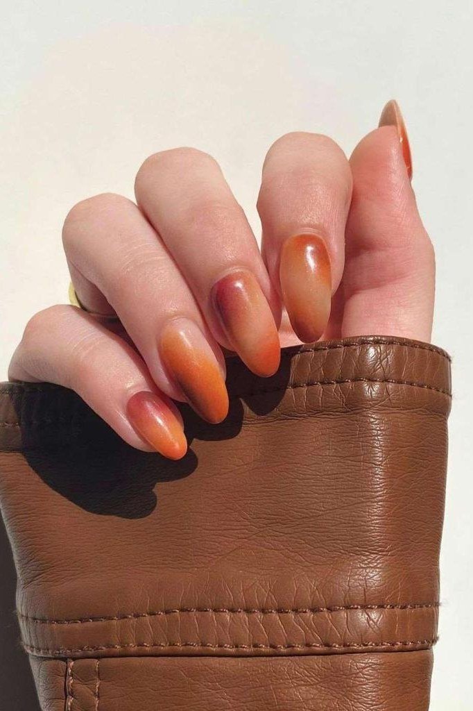 Rust ombre nails with delicate art, fall nail design for older women