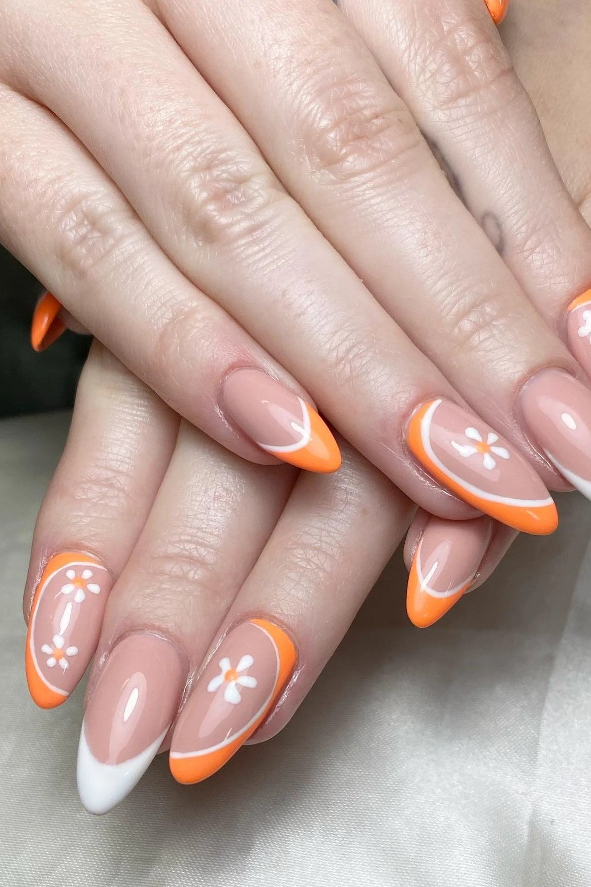 Orange with White Daisy Art - fall nail color idea for women over 60