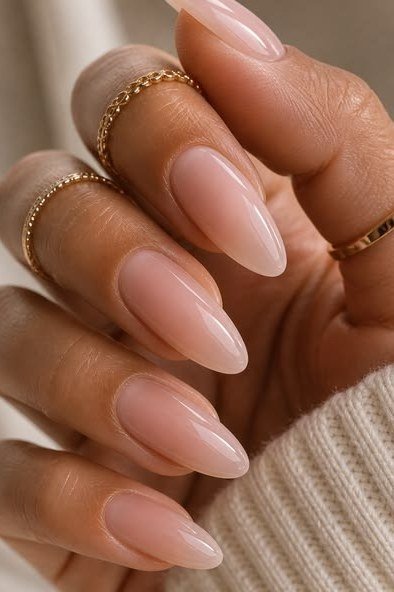 Rosy Nude Almond with Gold Rings - elegant nude nail design for women over 60