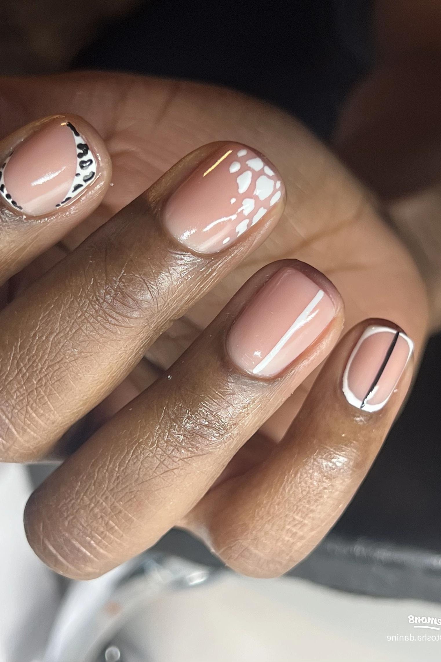 Nude with Marble and Line Art - short nude nail idea for women over 50