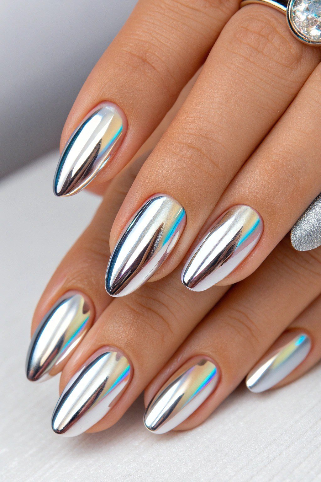 Silver Holographic Chrome Almond Nails - chrome nail designs for women over 60
