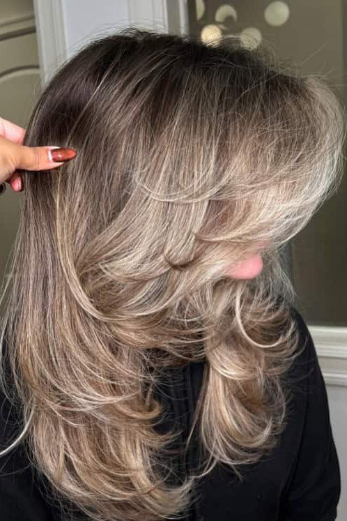 Ash Blonde Butterfly with Lifted Crown - butterfly cut hairstyle for women over 60