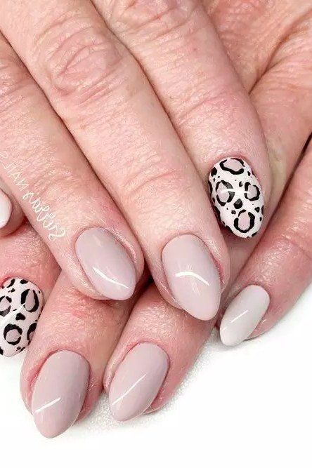 pale taupe nails with leopard print accent nails