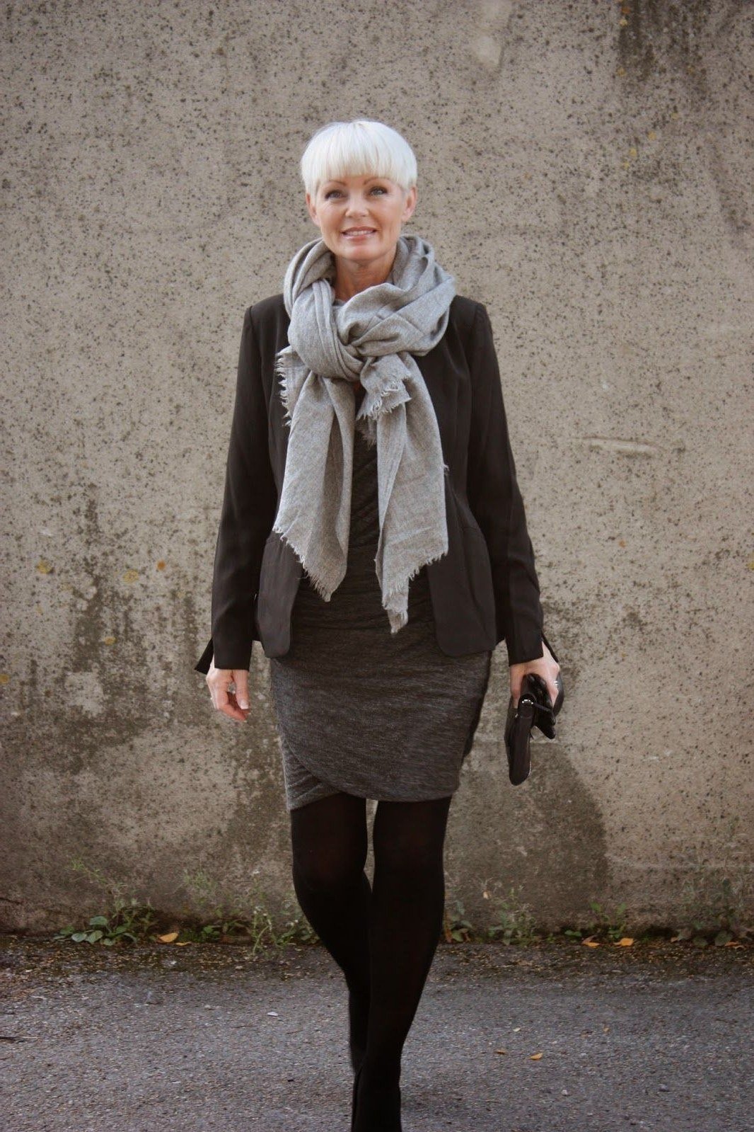 Black coat with grey scarf fall outfit idea for women over 60