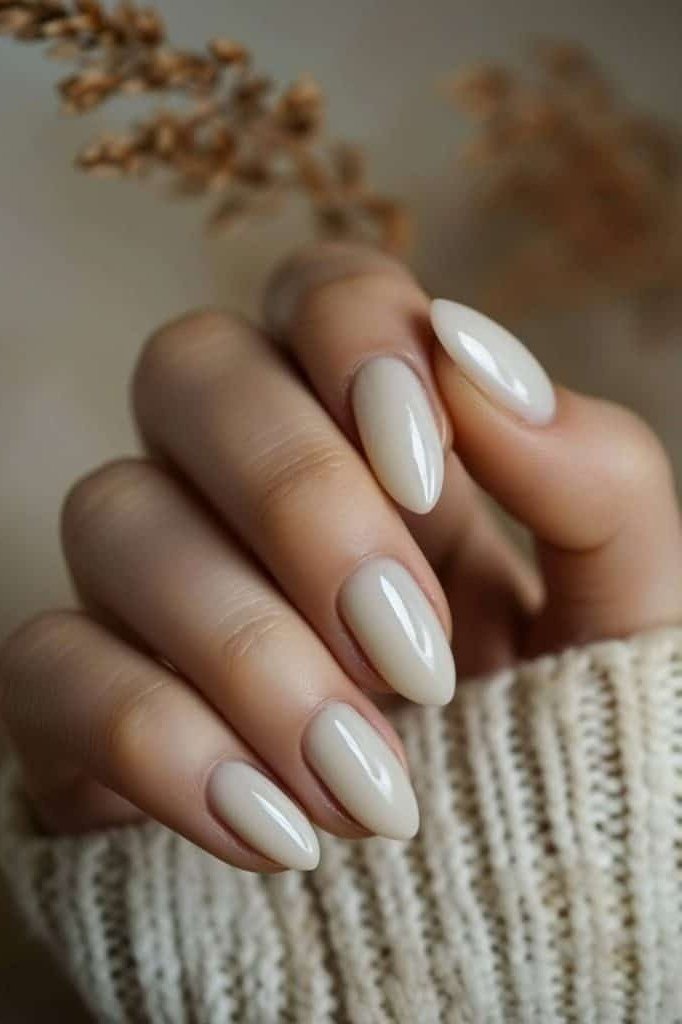 short almond, pearly white, hand in cream knit sleeve , for women over 60