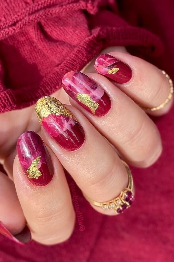 Burgundy nails with gold foil accent nails for women over 50