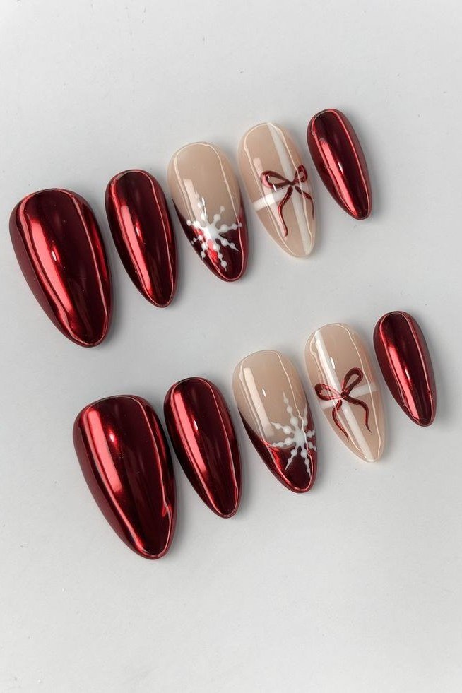 red chrome and nude christmas press-on nails with bows