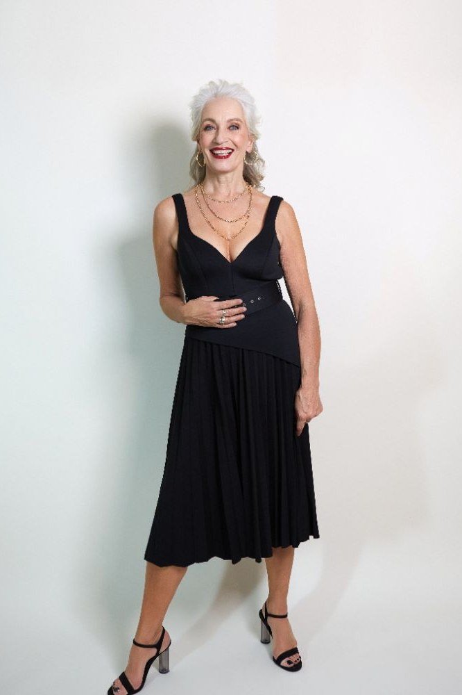 Black pleated V-neck midi dress for women over 50