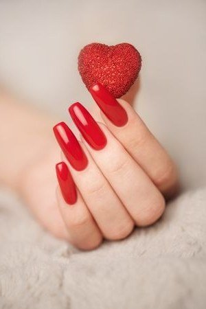 Red Almond with Heart Prop - elegant nail art idea for mature hands, women over 50