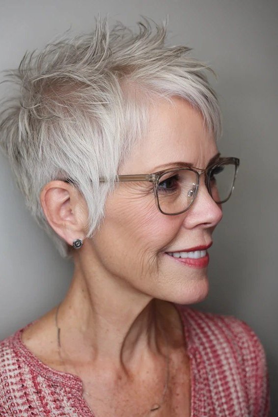 White Pixie with Chic Glasses - bold edgy pixie haircut for women over 50