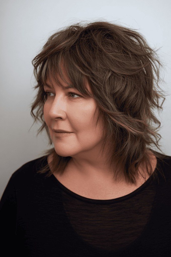 Soft Brunette Curly Shag - medium shag haircut for women over 40