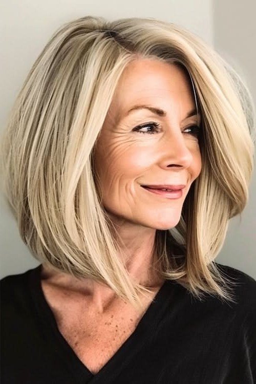 Sleek Blonde Angled Lob - medium hairstyle for women over 60