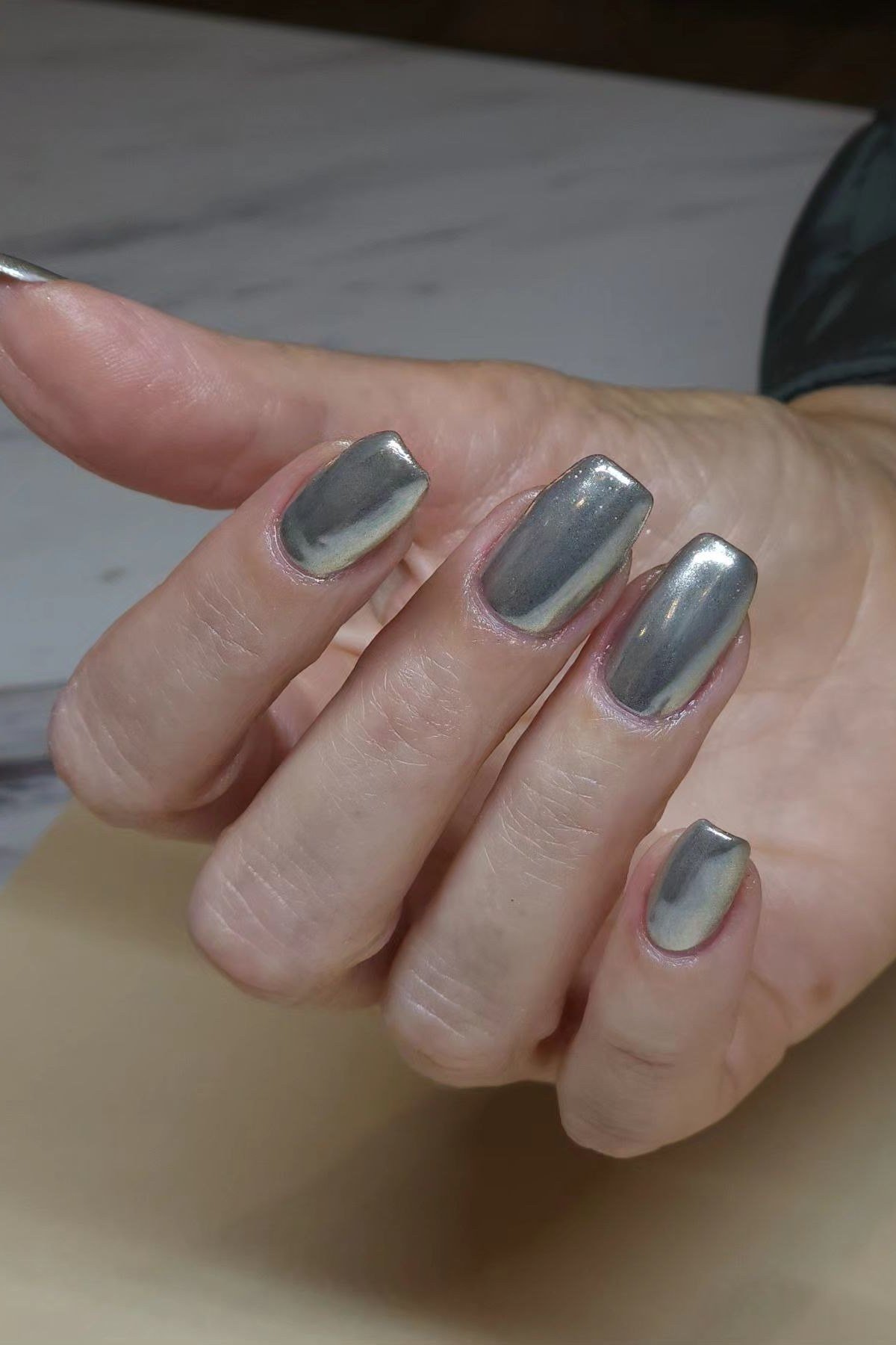 Dark Chrome Pearl - short nail design for women over 60 that makes nails look longer
