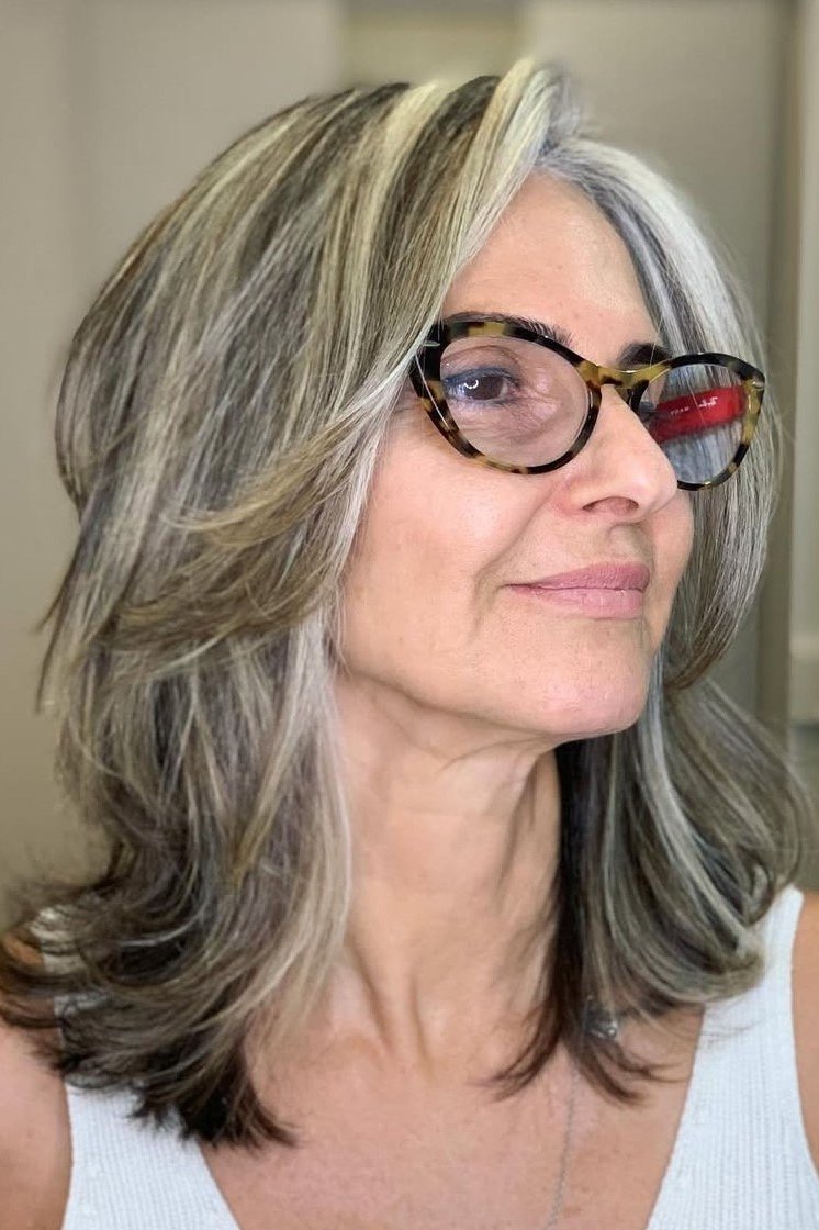 Layered Grey-Streaked Medium Hair - timeless hairstyle for women over 60
