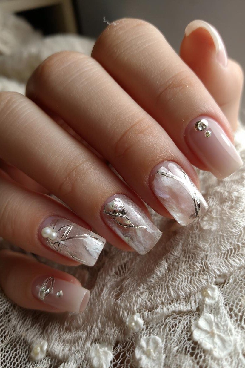 White and pink marble nails with gem, sophisticated nail design for women over 50