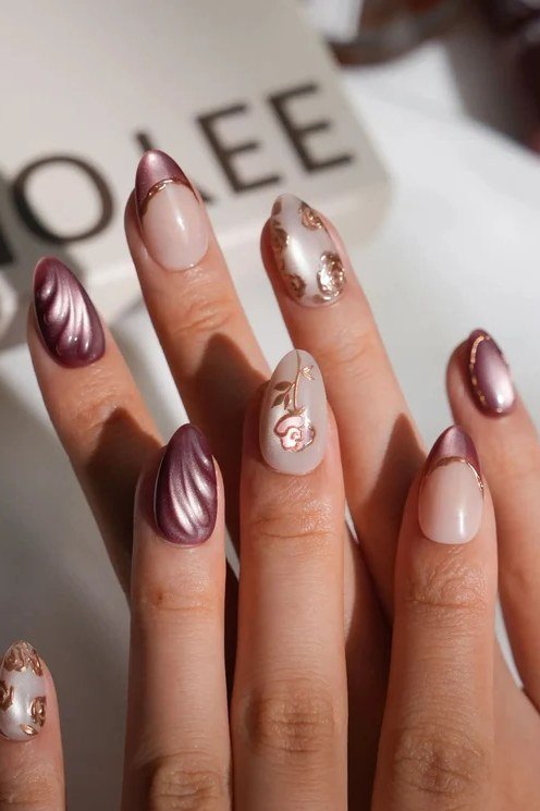 Mauve Almond Nails with Gold Foil Flakes, elegant mauve nail idea for women over 60