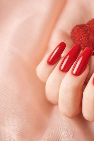Red Almond on Satin - elegant nail art idea for mature hands, women over 50