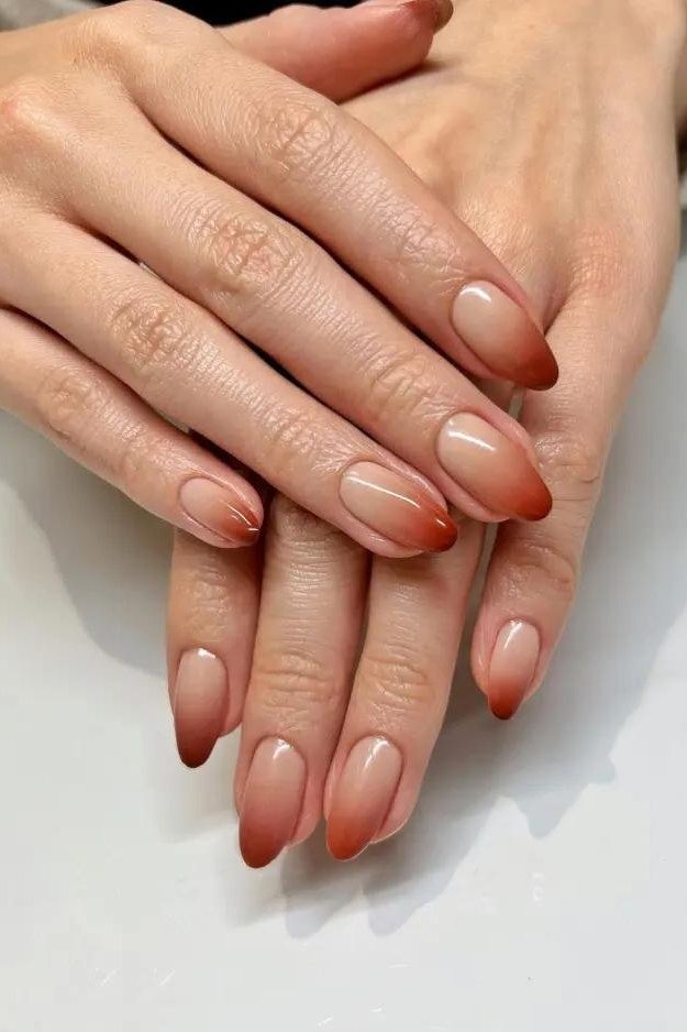 59. Nude Nails With Burnt Orange Ombre Tips - Thanksgiving nail art idea for women over 50
