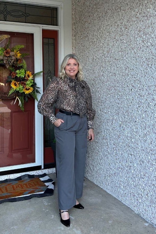 Black Puffer Vest with Dark Jeans on a woman over 50, fall outfit idea
