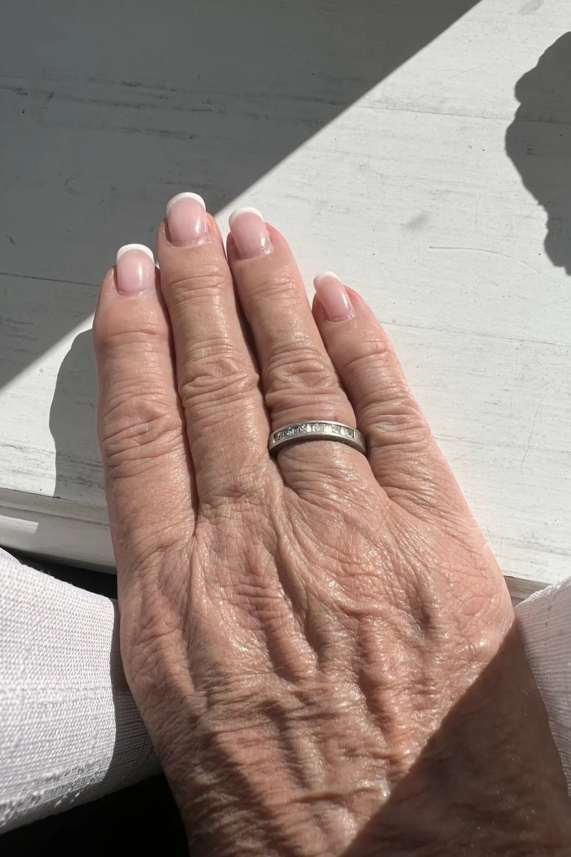 sheer nails with tiny subtle accents for older women